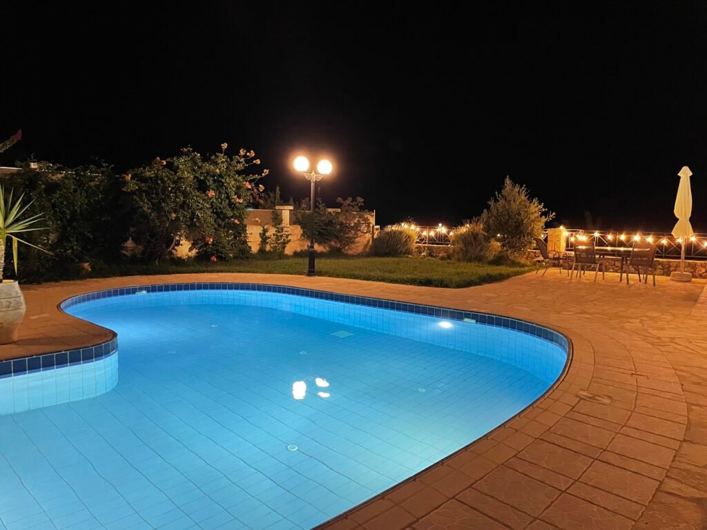 Get in Touch image showing the pool at night