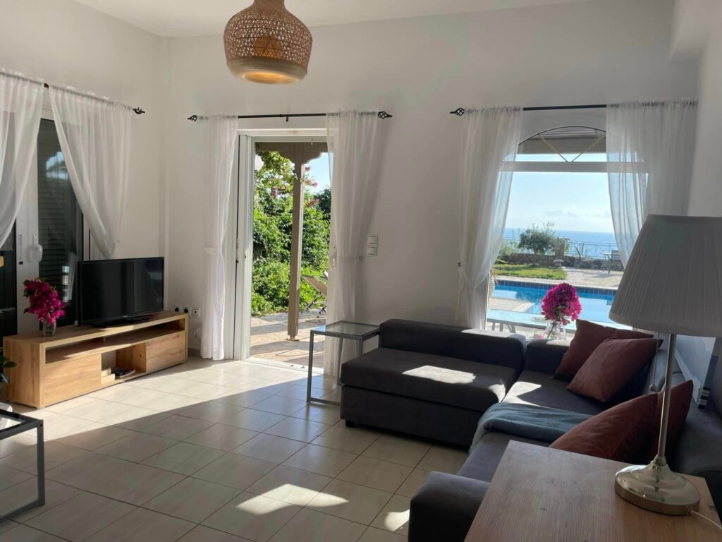 Gallery image depicting the lounge looking out towards the pool