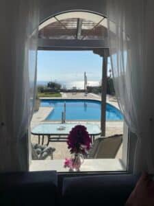 Gallery image looking through the window from the lounge to the pool